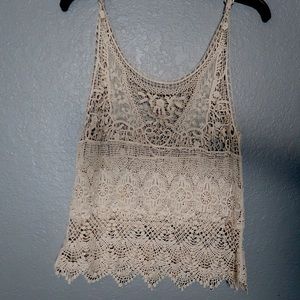 Lace appliqué blouse.